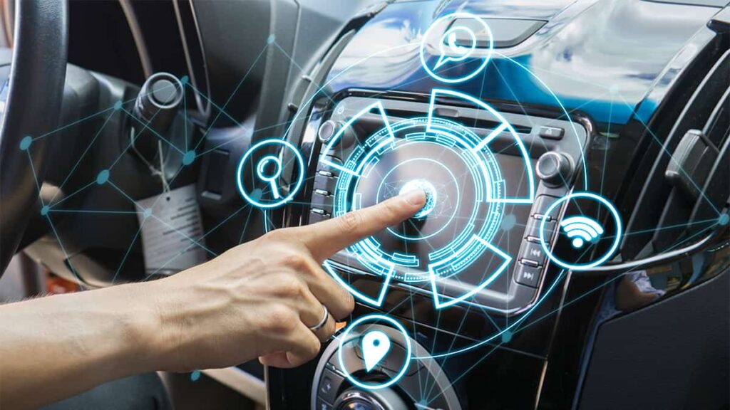 Foto com ilustração de pessoa tocando em painel de carro e expandindo menu holográfico de recursos
